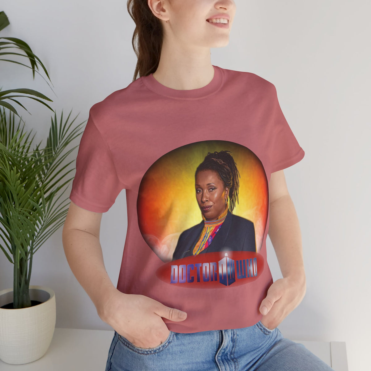 The Fugitive Doctor (Jo Martin) and Doctor Who logo.